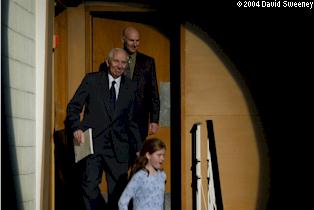 Music Director and Accompanist enter auditorium.