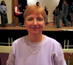 Wanita Ellis poses for a photo in the auditorium.