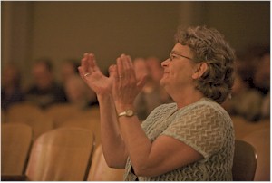 Judi White clapping.