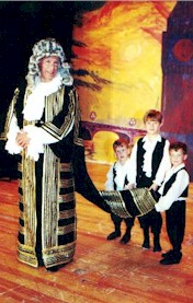 Lord Chancellor with three young paiges holding his train