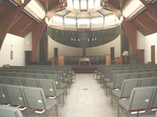 A look at the seats in the auditorium looking from the back to the stage.